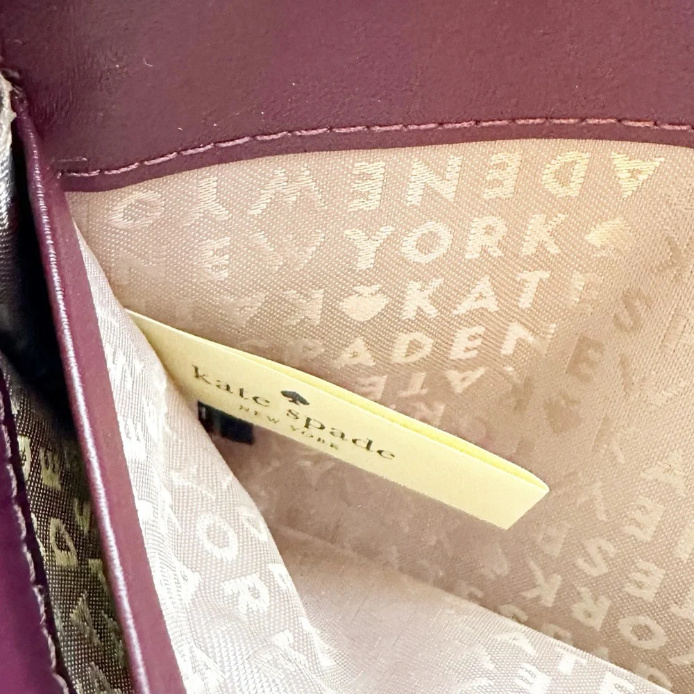 Kate Spade Anderson Way Ciara Wristlet in Deep Plum